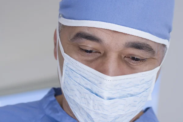 Close up of African male doctor with surgical mask
