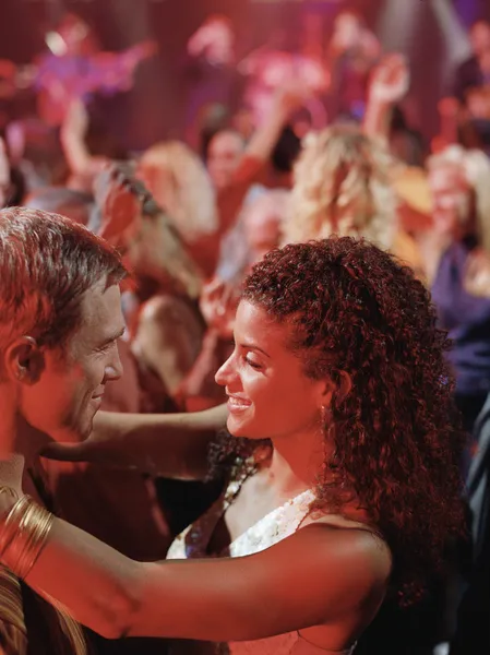 Couple dancing at nightclub