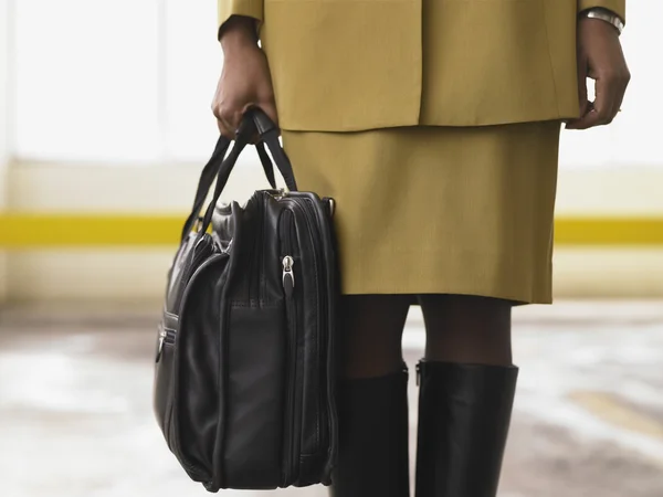 Businesswoman holding a briefcase