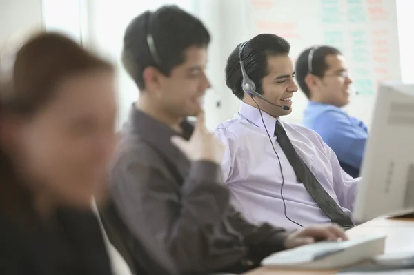 Call center workers on the job