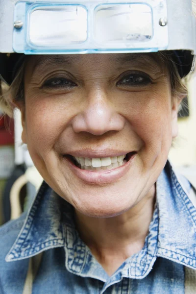 Portrait of female welder