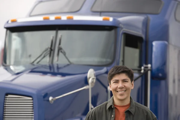 Man standing in front of truck