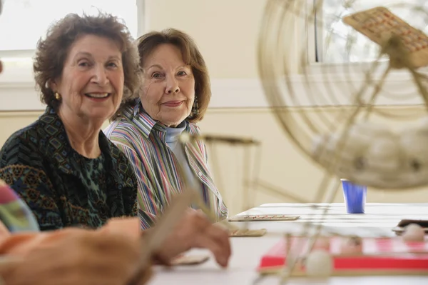 Elderly women playing bingo