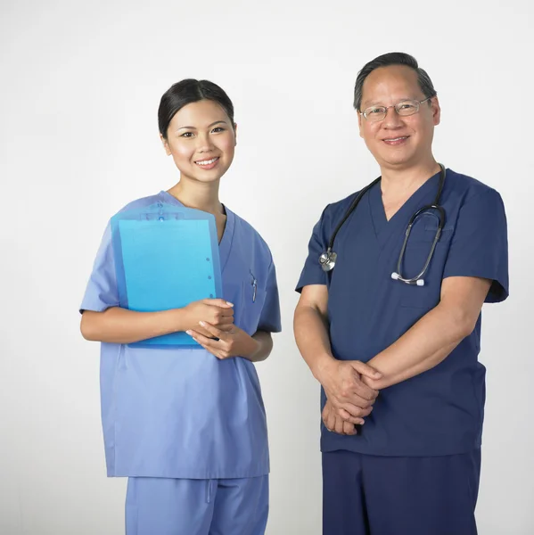 Portrait of Asian male and female doctors
