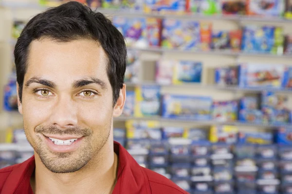 Pacific Islander man in toy store