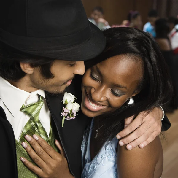 Multi-ethnic teenaged couple at prom