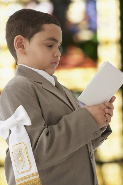 Hispanic boy in church — Stock Photo #23322548