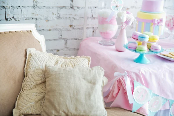 White sofa in a Provence style with well decorated pillows