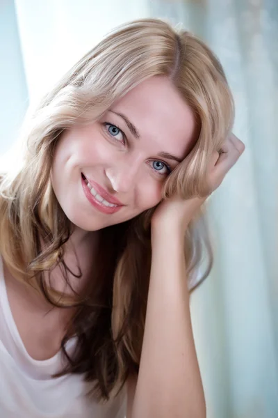 Portrait of a beautiful female model on white background