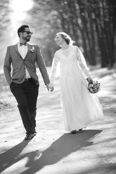 Black and white picture of happy wedding couple together.