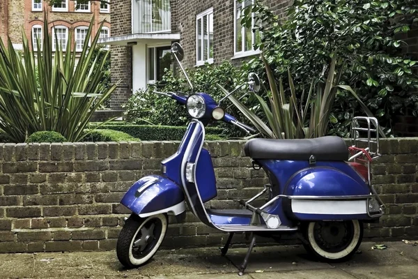 Scooter in Notting hill, London