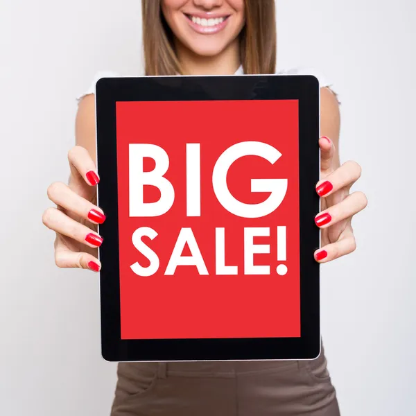 Big sale text on red tablet pc screen