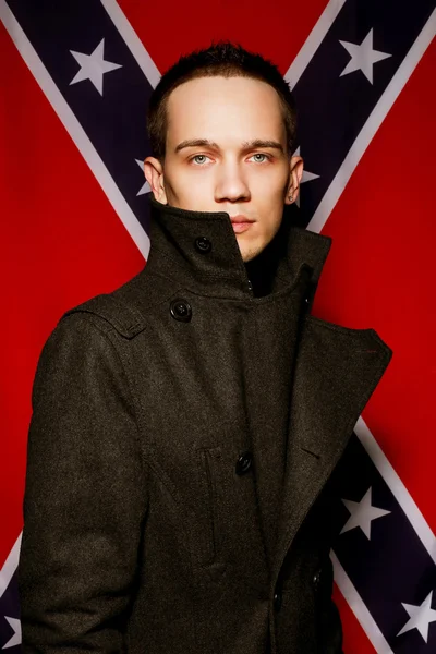 Fashionable male model over background made of american flag. gr