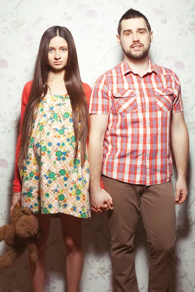 Stylish pregnancy concept: portrait of couple of hipsters (husba