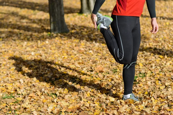 Man stretching quadriceps muscle