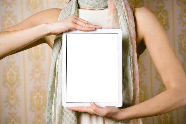 Vintage fashion woman showing tablet screen