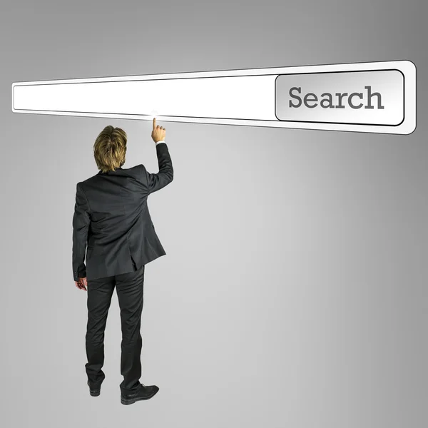 Businessman touching a blank navigation Search bar