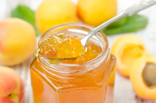 Apricot marmalade in a spoon close-up