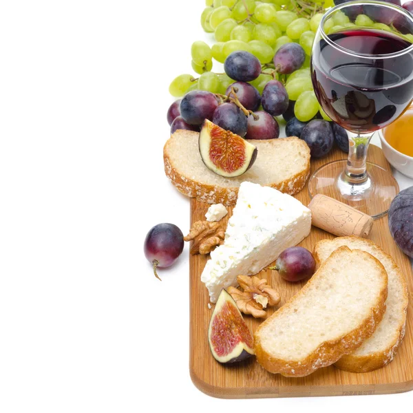 Snacks - cheese, bread, figs, grapes, nuts and wine