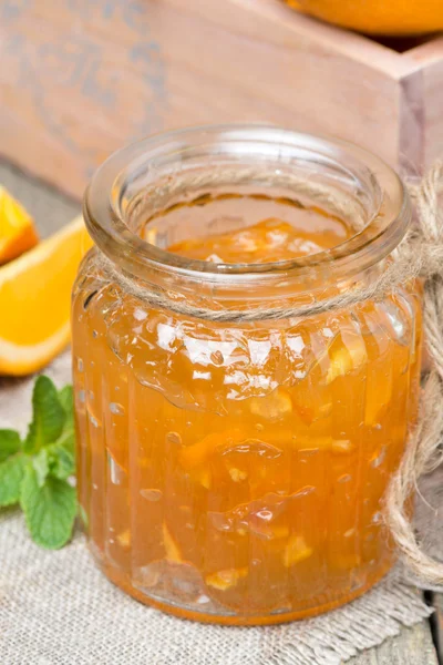 Delicious orange marmalade in a glass jar