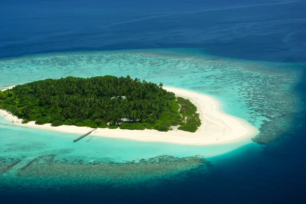 Tropical Maldivian island from above