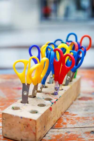 Colorful scissors for children for making art, closeup.