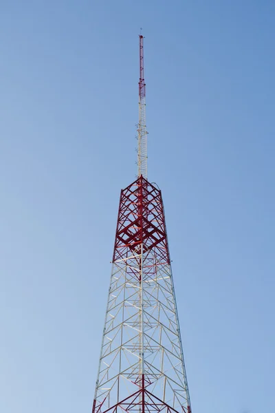 TV RADIO TOWER AGAINST A BLUE SKY