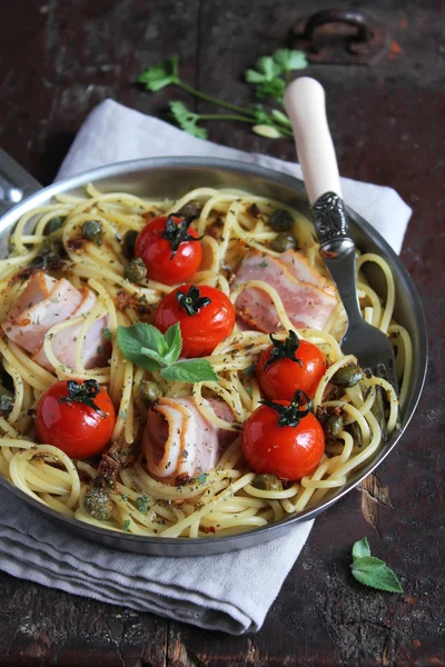 Spaghetti pasta with roasted cherry tomatoes