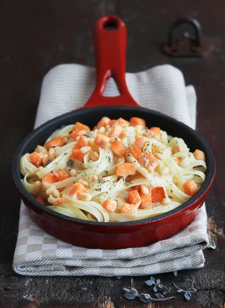 Whole wheat spaghetti or linguine pasta with roasted salmon