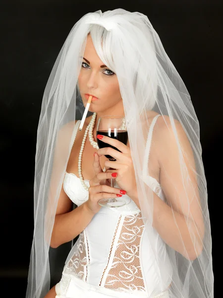 Young Woman Bride Drinking and Smoking