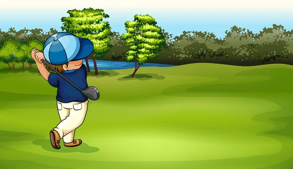A boy playing golf