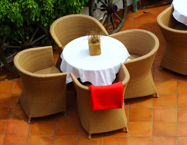 Tables and chairs in open air