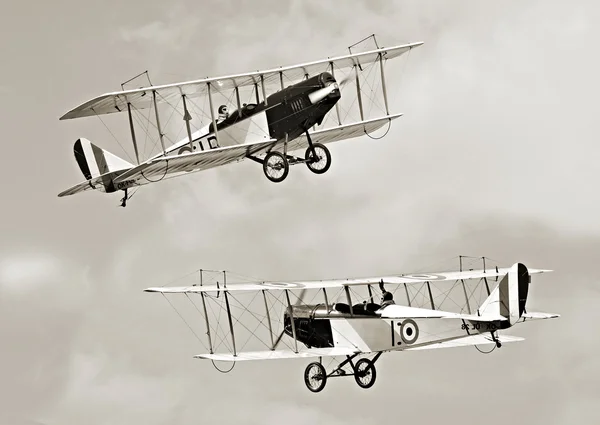 Two biplanes on sky