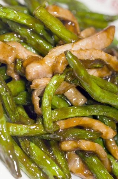 Chinese food chicken strips with string beans