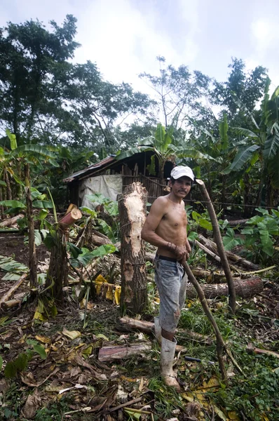 Editorial one arm man working in jungle nicaragua