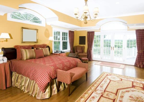 Large master bedroom with window light
