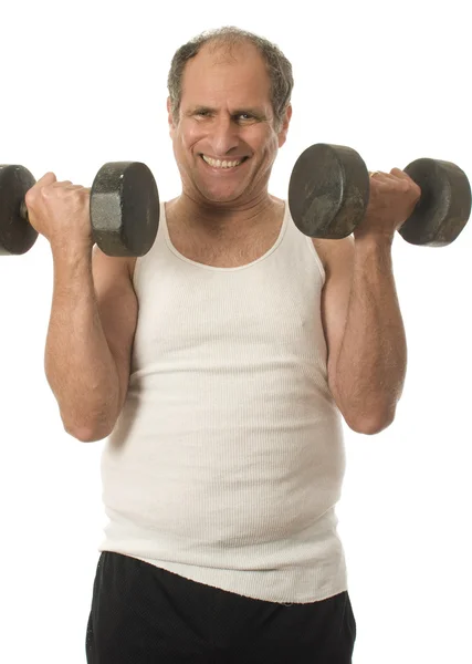 Middle age senior man working out with dumbbell weights