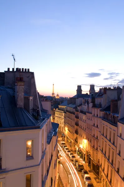 Night scene with car movement light streaks Rue de Vaugirard