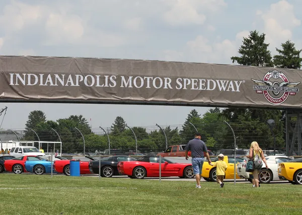 Colorful Corvettes in line at the Indianapolis Motor Speedway Parking Lot