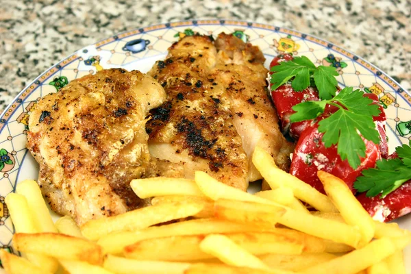 Grilled chicken steak with french fries