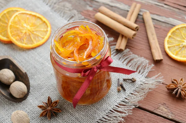 Homemade candied peels orange jam in glass jar