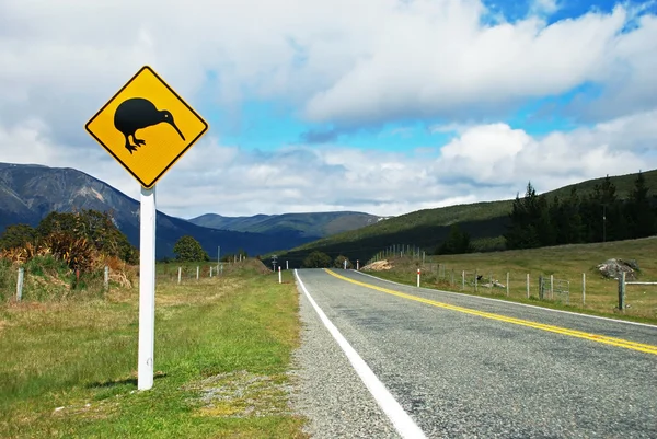 Kiwi sign by the road