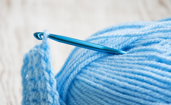 Crochet hook and knitting yarn