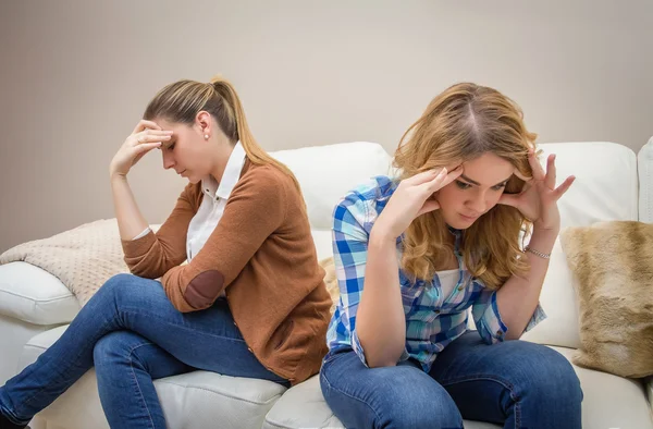 Furious mother arguing with her teenage daughter