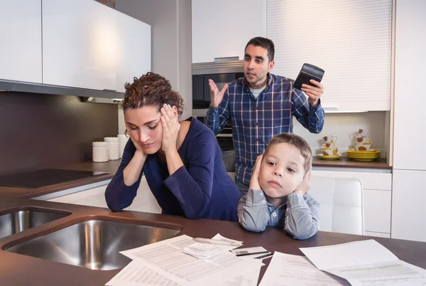 Worried mother suffering while father scream