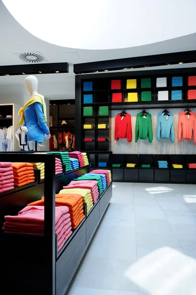 Colorful clothes shop interior
