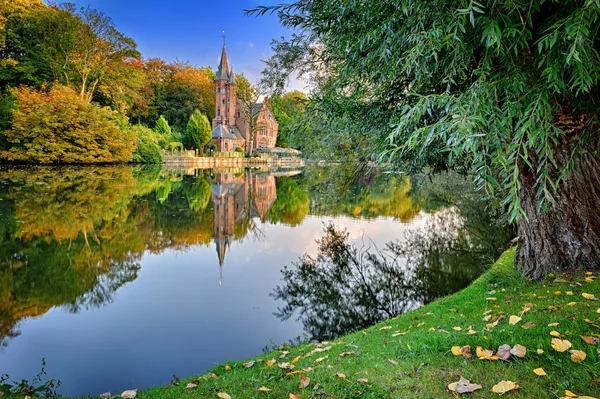 Autumn landscape with old mansion