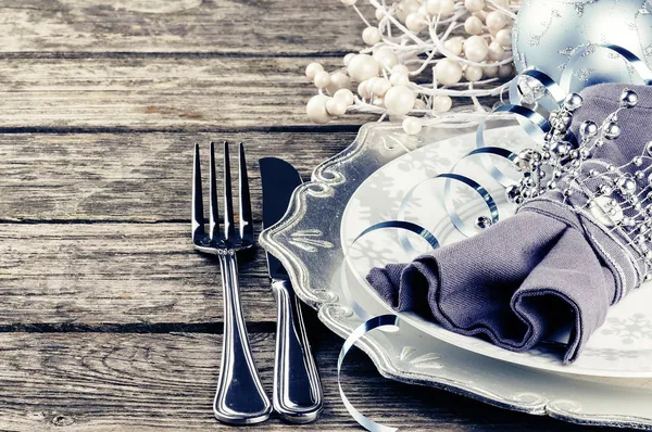 Christmas table setting in silver tone