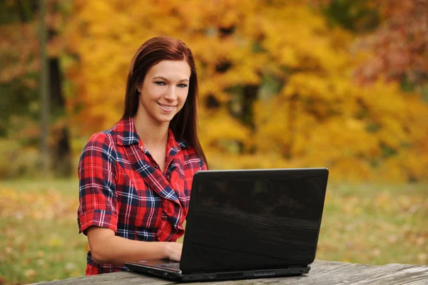 Young Woman with laptop computer