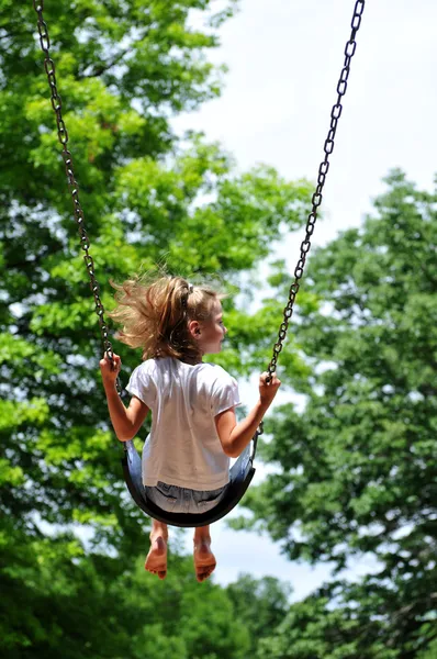 Young Girl on a swing